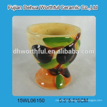 Mini ceramic egg cup with olive figure